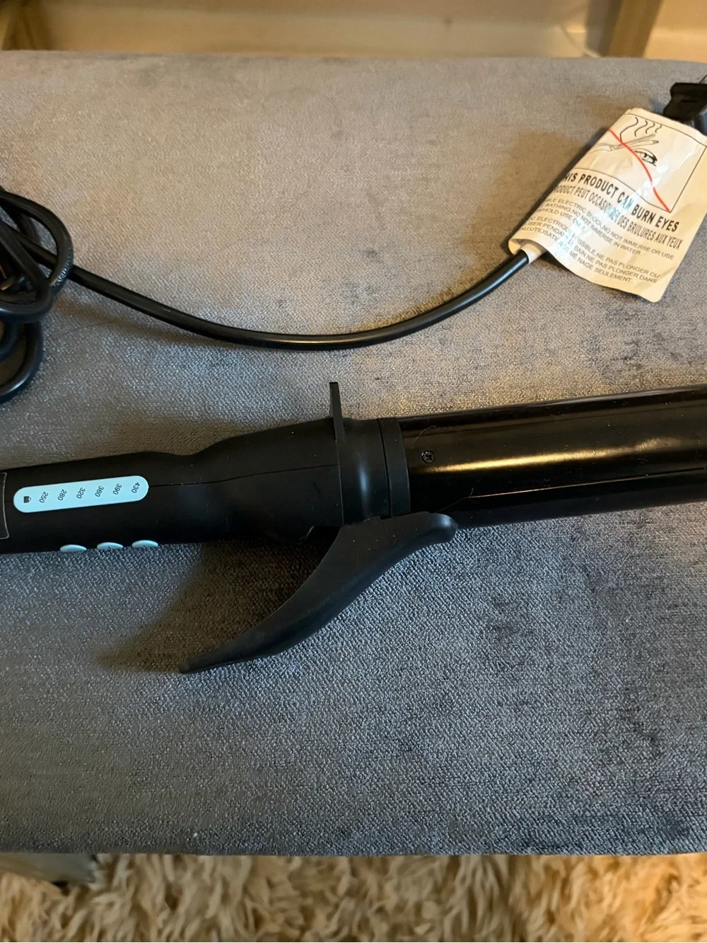Bio Ionic Black long barrel curling iron/Styling Iron. 1.5 inch. Used one time.